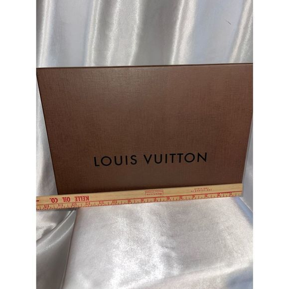 Authentic Louis Vuitton box
14 in. X 10 X 2 in. 

Item 807 - Picture 3 of 3
